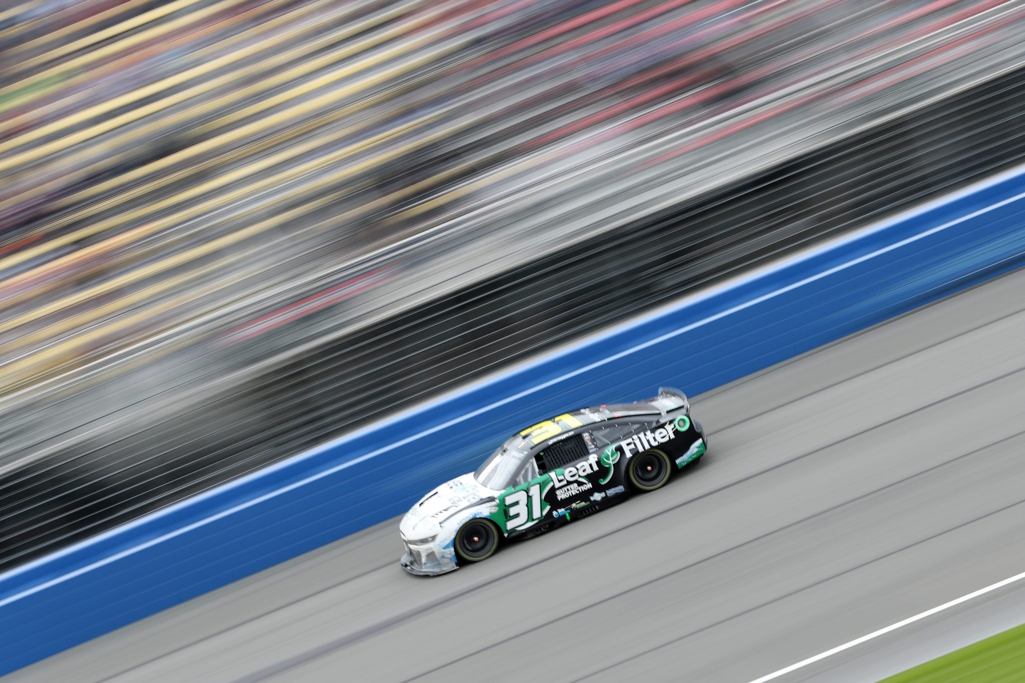 FONTANA, CALIFORNIA - FEBRUARY 26: Justin Haley, driver of the #31 LeafFilter Gutter Protection Chevrolet, drives during the NASCAR Cup Series Pala Casino 400 at Auto Club Speedway on February 26, 2023 in Fontana, California. (Photo by Meg Oliphant/Getty Images) | Getty Images