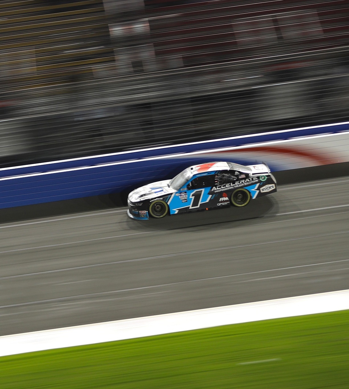 FONTANA, CALIFORNIA - FEBRUARY 26: Sheldon Creed, driver of the #2 Whelen Chevrolet, and Sam Mayer, driver of the #1 Accelerate Pros Talent Chevrolet, race during the NASCAR Xfinity Series Production Alliance Group 300 at Auto Club Speedway on February 26, 2023 in Fontana, California. (Photo by Meg Oliphant/Getty Images) | Getty Images