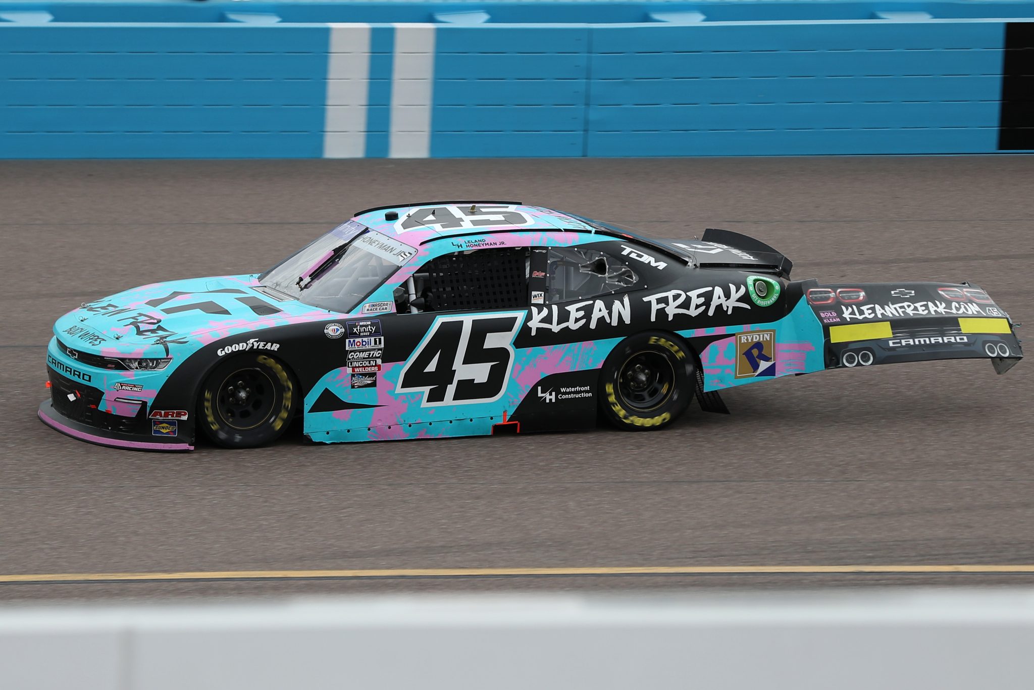 AVONDALE, ARIZONA - MARCH 11: Leland Honeyman, driver of the #45 Klean Freak Body Wipes Chevrolet, drives with a damaged TV panel after an on-track incident during the NASCAR Xfinity Series United Rentals 200 at Phoenix Raceway on March 11, 2023 in Avondale, Arizona. (Photo by Meg Oliphant/Getty Images) | Getty Images