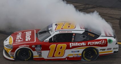 AVONDALE, ARIZONA - MARCH 11: Sammy Smith, driver of the #18 Pilot Flying J Toyota, celebrates with a burnout after winning the NASCAR Xfinity Series United Rentals 200 at Phoenix Raceway on March 11, 2023 in Avondale, Arizona. (Photo by Chris Graythen/Getty Images) | Getty Images