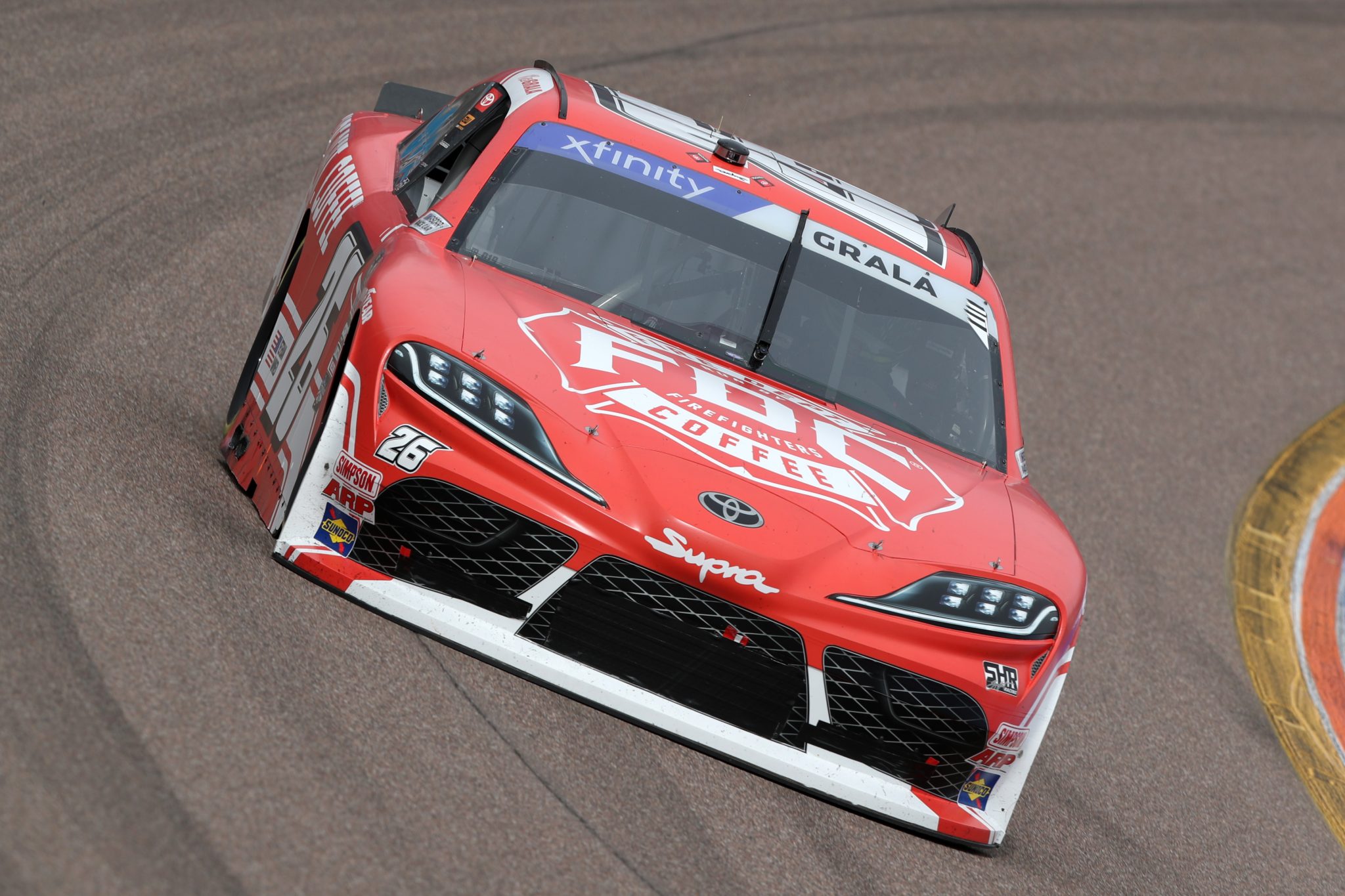 AVONDALE, ARIZONA - MARCH 11: Kaz Grala, driver of the #26 Fire Department Coffee Toyota, drives during qualifying for the NASCAR Xfinity Series United Rentals 200 at Phoenix Raceway on March 11, 2023 in Avondale, Arizona. (Photo by Meg Oliphant/Getty Images) | Getty Images