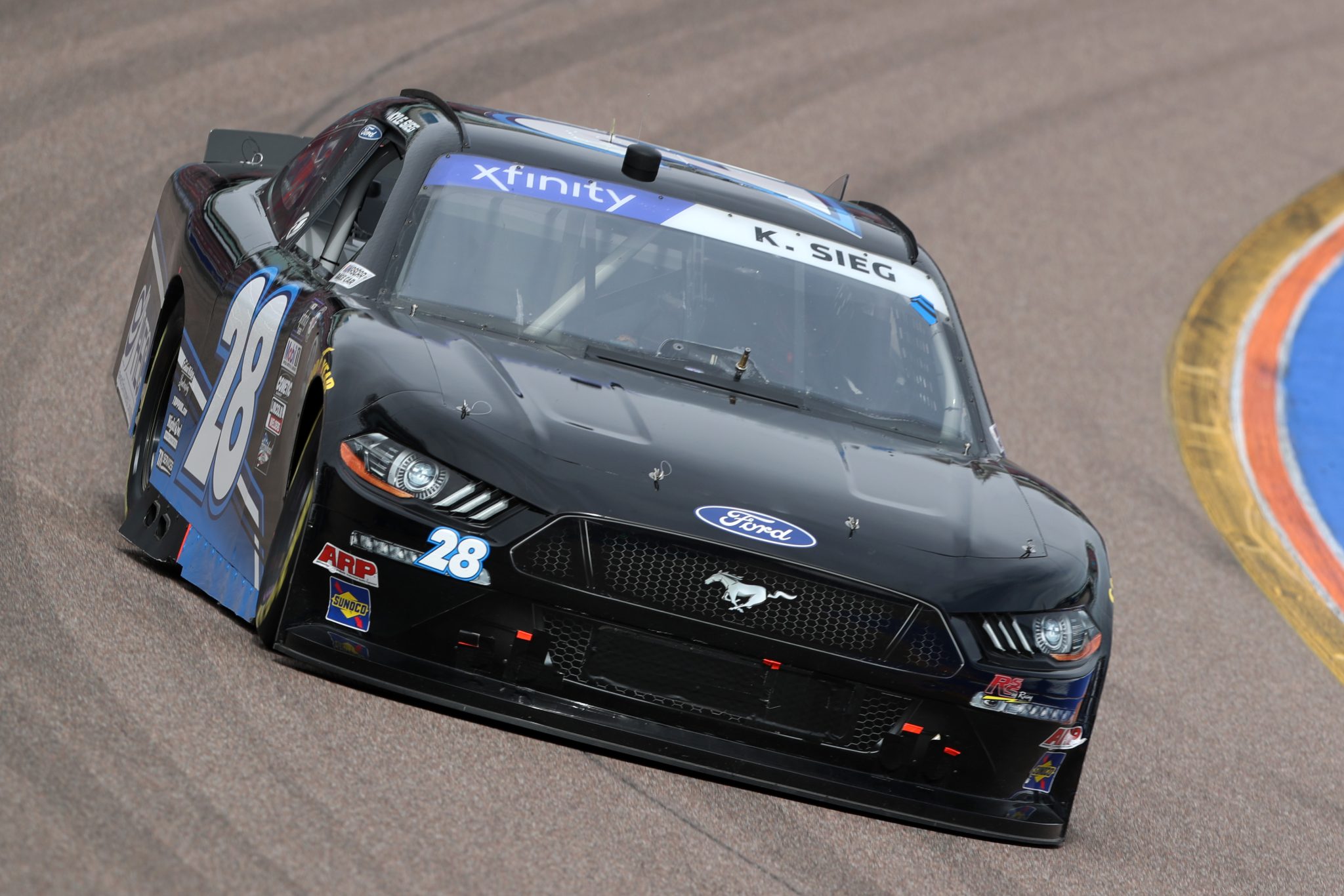AVONDALE, ARIZONA - MARCH 11: Kyle Sieg, driver of the #28 Ford, drives during qualifying for the NASCAR Xfinity Series United Rentals 200 at Phoenix Raceway on March 11, 2023 in Avondale, Arizona. (Photo by Meg Oliphant/Getty Images) | Getty Images
