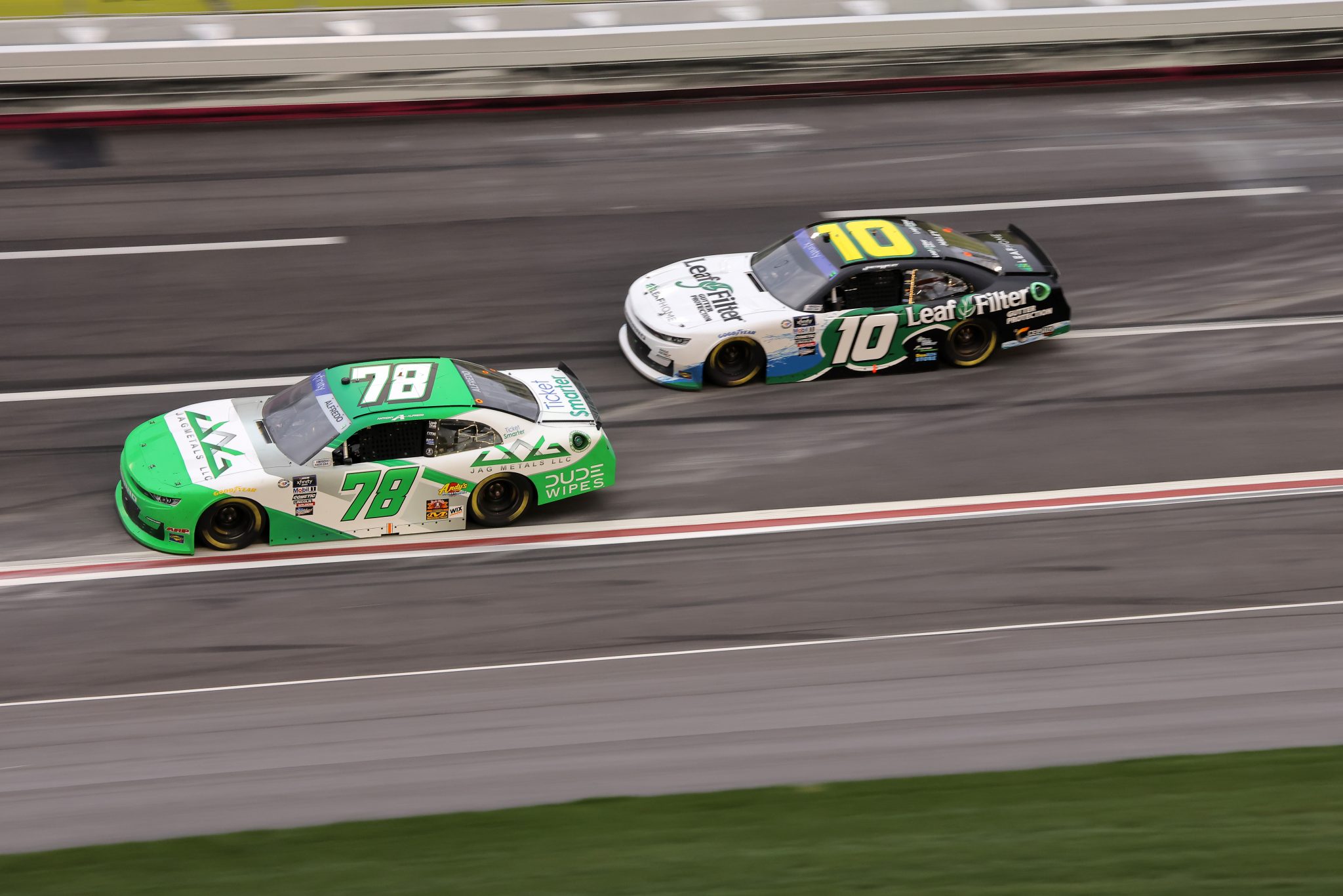 HAMPTON, GEORGIA - MARCH 18: Anthony Alfredo, driver of the #78 JAG Metals LLC Chevrolet, and Justin Haley, driver of the #10 LeafFilter Gutter Protection Chevrolet, race during the NASCAR Xfinity Series RAPTOR 250 at Atlanta Motor Speedway on March 18, 2023 in Hampton, Georgia. (Photo by Jonathan Bachman/Getty Images) | Getty Images