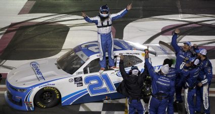 HAMPTON, GEORGIA - MARCH 18: Austin Hill, driver of the #21 Bennett Transportation Chevrolet, and crew celebrate after winning the NASCAR Xfinity Series RAPTOR 250 at Atlanta Motor Speedway on March 18, 2023 in Hampton, Georgia. (Photo by Sean Gardner/Getty Images) | Getty Images