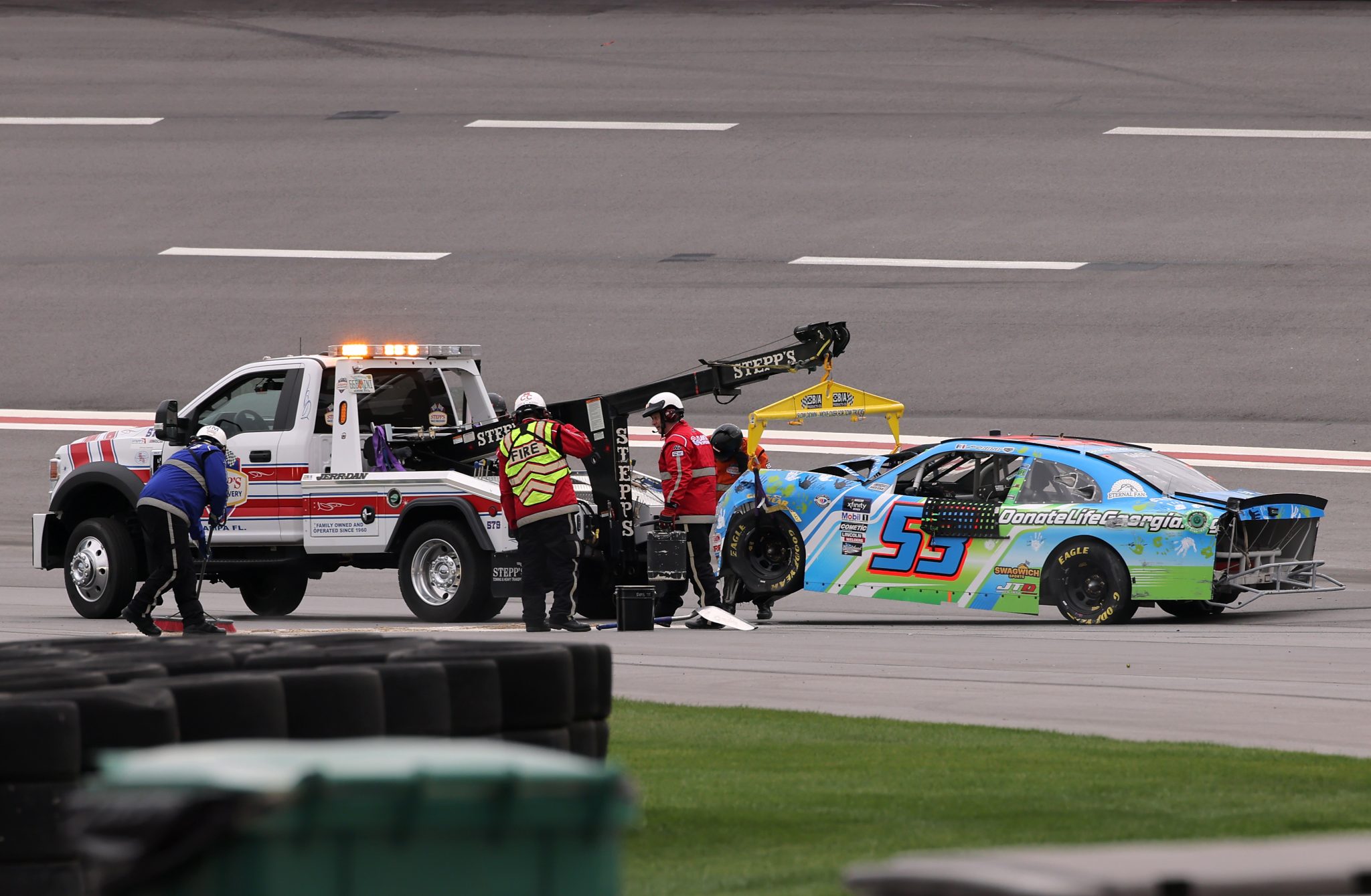 HAMPTON, GEORGIA - MARCH 18:, The NASCAR Safety Crew tows the #53 Donate Life GA Chevrolet, driven by Joey Gase after an on-track incident during the NASCAR Xfinity Series RAPTOR 250 at Atlanta Motor Speedway on March 18, 2023 in Hampton, Georgia. (Photo by Jonathan Bachman/Getty Images) | Getty Images