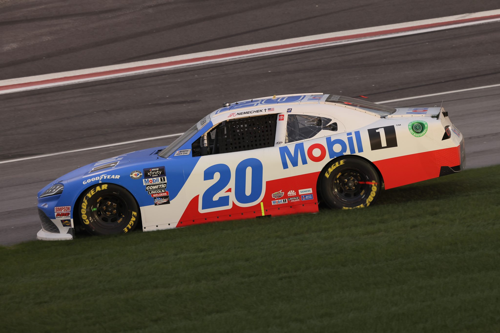 HAMPTON, GEORGIA - MARCH 18: John Hunter Nemechek, driver of the #20 Mobil 1 Toyota, spins into the infield grass after an on-track incident during the NASCAR Xfinity Series RAPTOR 250 at Atlanta Motor Speedway on March 18, 2023 in Hampton, Georgia. (Photo by Jonathan Bachman/Getty Images) | Getty Images