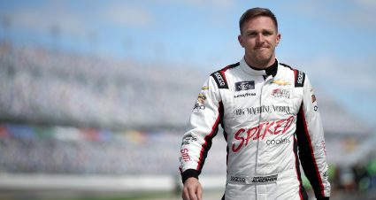 DAYTONA BEACH, FLORIDA - FEBRUARY 18: Parker Kligerman, driver of the #48 Big Machine Racing Spiked Chevrolet, walks the grid during qualifying for the Beef. It's What's For Dinner. 300 at Daytona International Speedway on February 18, 2023 in Daytona Beach, Florida. (Photo by James Gilbert/Getty Images) | Getty Images