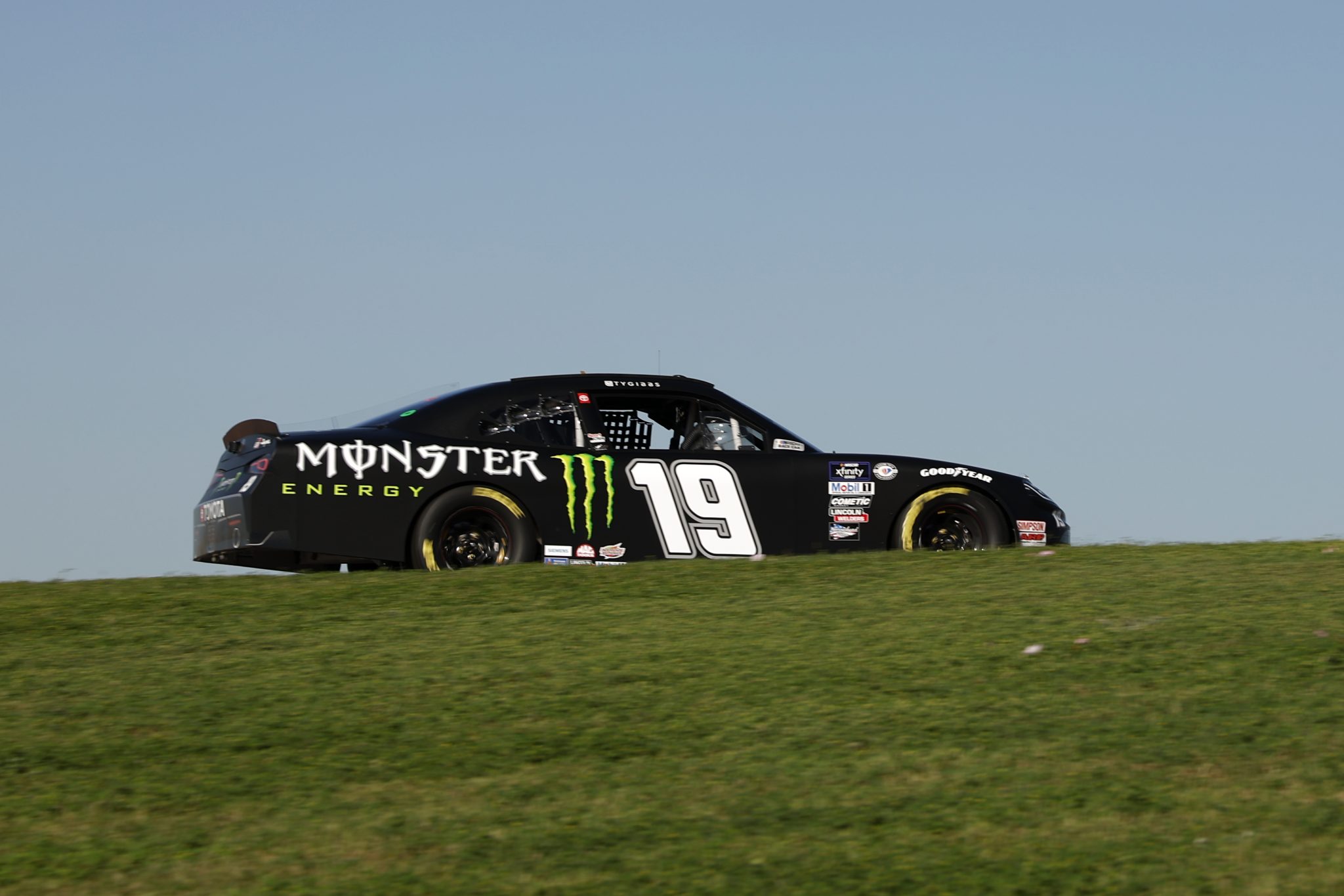 AUSTIN, TEXAS - MARCH 24: Ty Gibbs, driver of the #19 Monster Energy Toyota, drives during practice for the NASCAR Xfinity Series Pit Boss 250 at Circuit of The Americas on March 24, 2023 in Austin, Texas. (Photo by Chris Graythen/Getty Images) | Getty Images