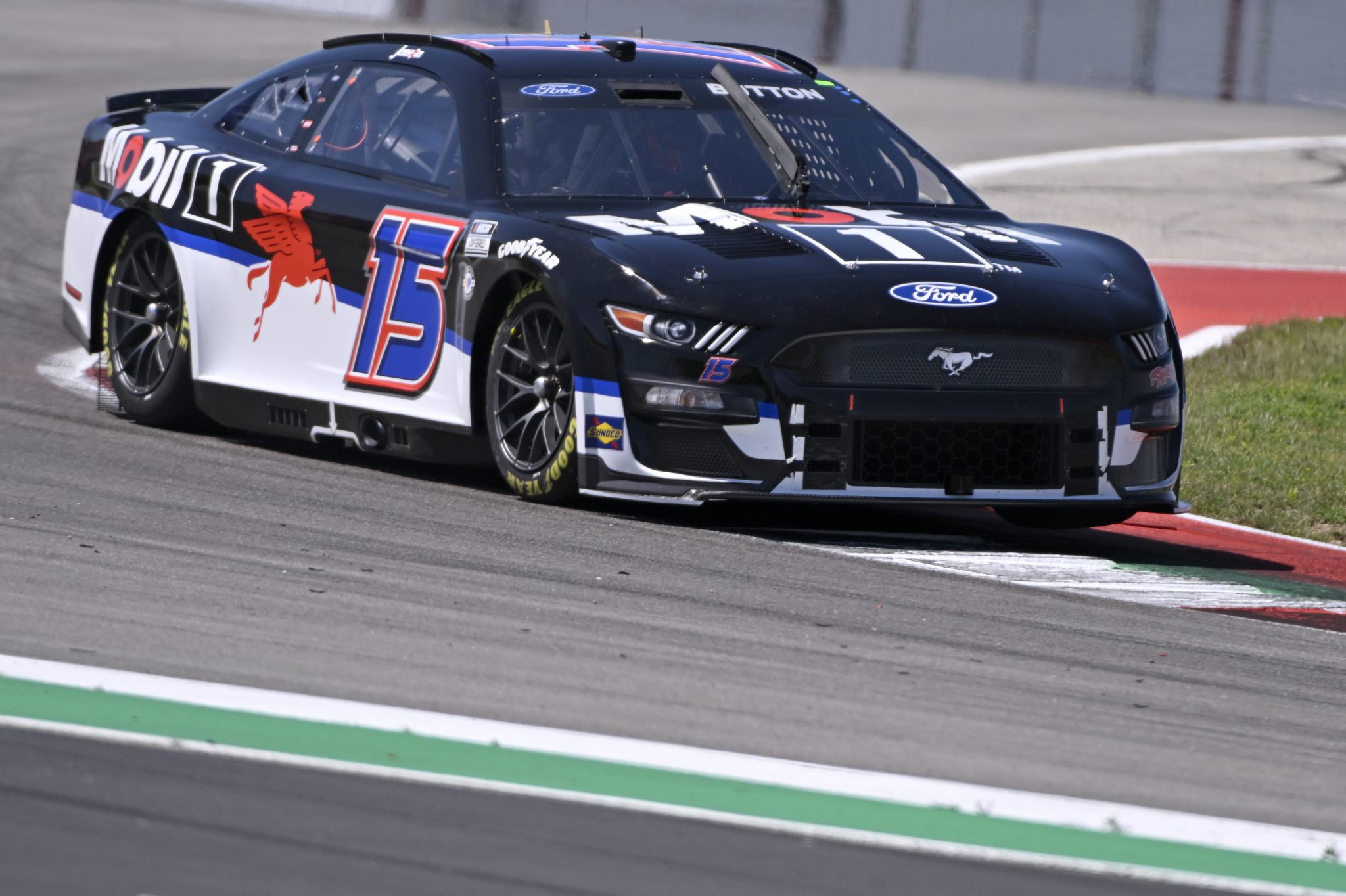 AUSTIN, TEXAS - MARCH 24: Jenson Button, driver of the #15 Mobil 1 Ford, drives during practice for the NASCAR Cup Series EchoPark Automotive Grand Prix at Circuit of The Americas on March 24, 2023 in Austin, Texas. (Photo by Logan Riely/Getty Images) | Getty Images