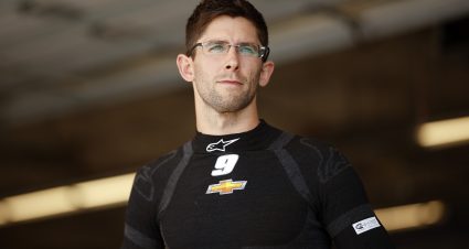 AUSTIN, TEXAS - MARCH 24: Jordan Taylor, driver of the #9 UniFirst Chevrolet, looks on in the garage area during practice for the NASCAR Cup Series EchoPark Automotive Grand Prix at Circuit of The Americas on March 24, 2023 in Austin, Texas. (Photo by Chris Graythen/Getty Images) | Getty Images