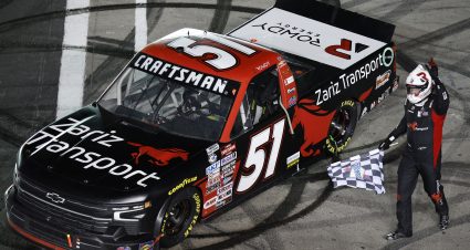 LAS VEGAS, NEVADA - MARCH 03: Kyle Busch, driver of the #51 Zariz Transport Chevrolet, celebrates with the checkered flag after winning the NASCAR CRAFTSMAN Truck Series Victoria's Voice Foundation 200 at Las Vegas Motor Speedway on March 03, 2023 in Las Vegas, Nevada. (Photo by Chris Graythen/Getty Images) | Getty Images
