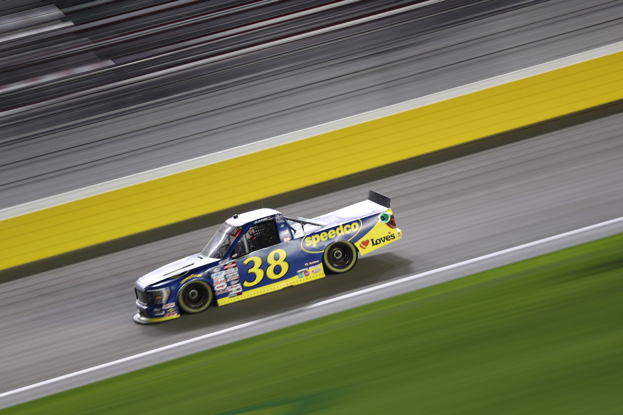 LAS VEGAS, NEVADA - MARCH 03: Zane Smith, driver of the #38 Speedco Ford, drives during the NASCAR CRAFTSMAN Truck Series Victoria's Voice Foundation 200 at Las Vegas Motor Speedway on March 03, 2023 in Las Vegas, Nevada. (Photo by Meg Oliphant/Getty Images) | Getty Images