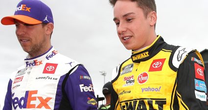 SONOMA, CALIFORNIA - JUNE 12: Denny Hamlin, driver of the #11 FedEx Freight Toyota, (L) and Christopher Bell, driver of the #20 DeWalt Toyota, walk the red carpet prior to the NASCAR Cup Series Toyota/Save Mart 350 at Sonoma Raceway on June 12, 2022 in Sonoma, California. (Photo by Sean Gardner/Getty Images) | Getty Images