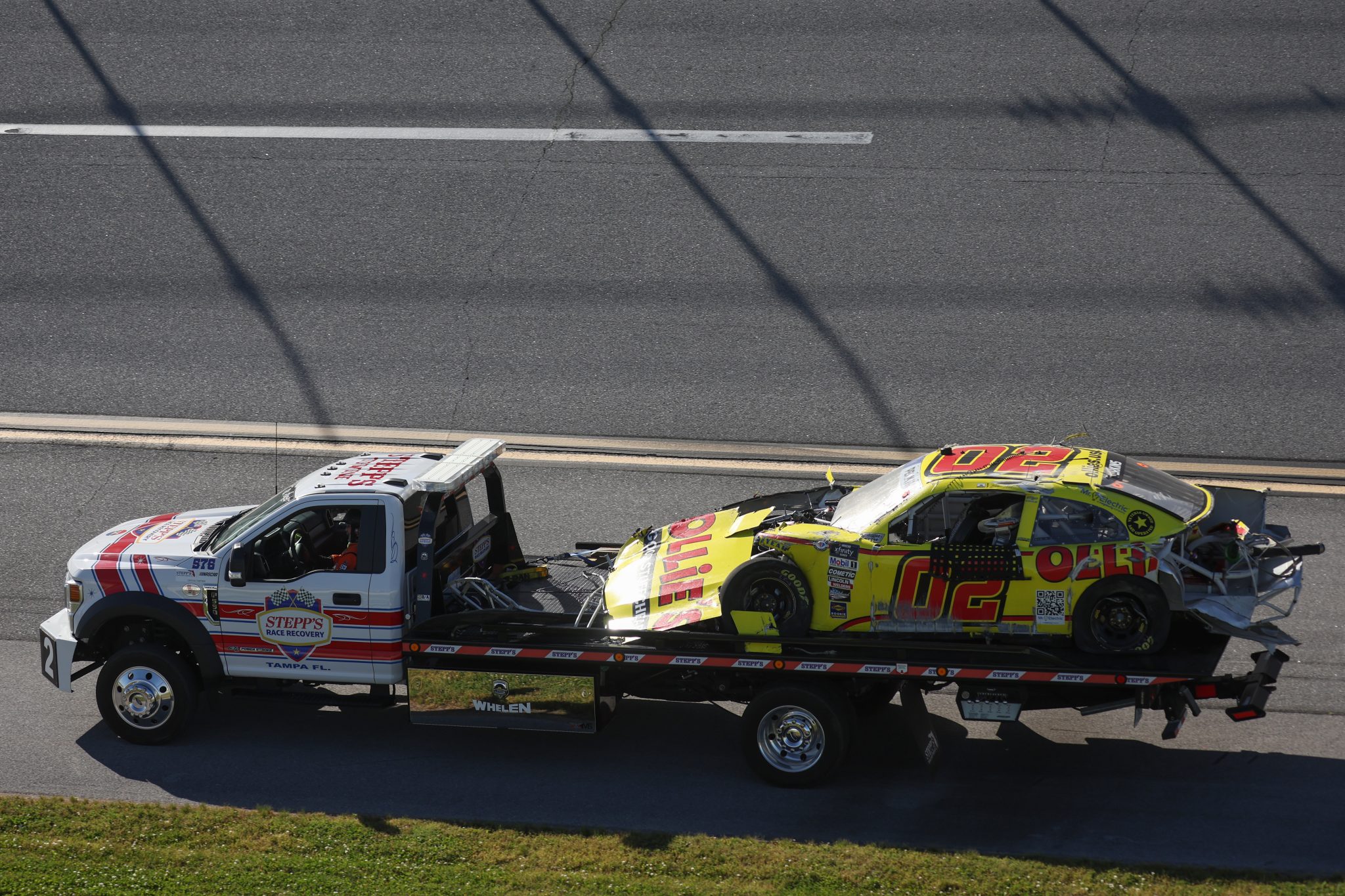 TALLADEGA, ALABAMA - APRIL 22: The #02 Ollie's Bargain Outlet Chevrolet, driven by Blaine Perkins is towed after an on-track incident during the NASCAR Xfinity Series Ag-Pro 300 at Talladega Superspeedway on April 22, 2023 in Talladega, Alabama. (Photo by James Gilbert/Getty Images) | Getty Images
