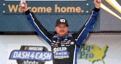 TALLADEGA, ALABAMA - APRIL 22: Jeb Burton, driver of the #27 Solid Rock Carriers Chevrolet, celebrates in victory lane after winning the NASCAR Xfinity Series Ag-Pro 300 at Talladega Superspeedway on April 22, 2023 in Talladega, Alabama. (Photo by James Gilbert/Getty Images) | Getty Images