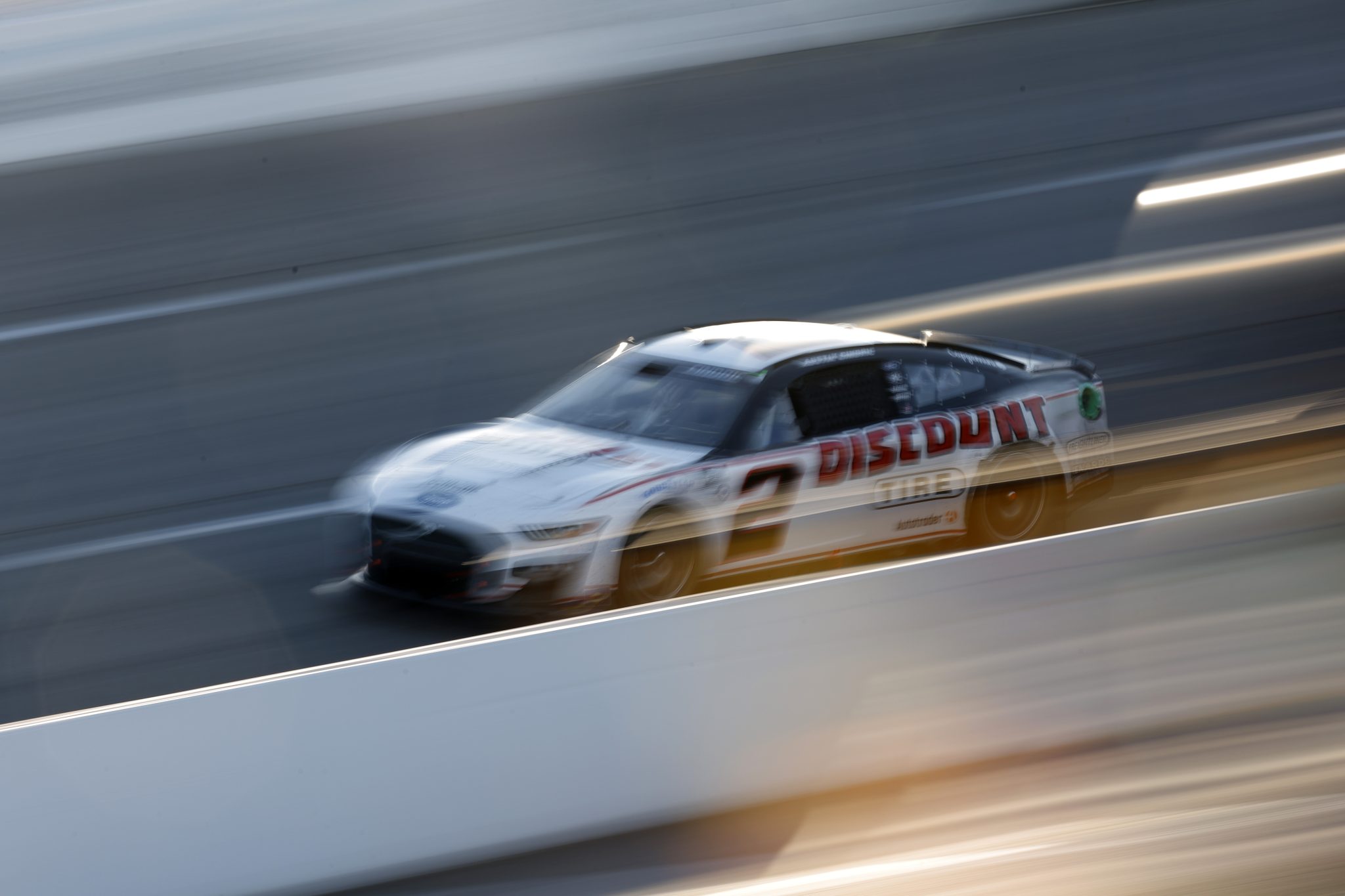 RICHMOND, VIRGINIA - APRIL 02: Austin Cindric, driver of the #2 Discount Tire Ford, drives during the NASCAR Cup Series Toyota Owners 400 at Richmond Raceway on April 02, 2023 in Richmond, Virginia. (Photo by Jared C. Tilton/Getty Images) | Getty Images