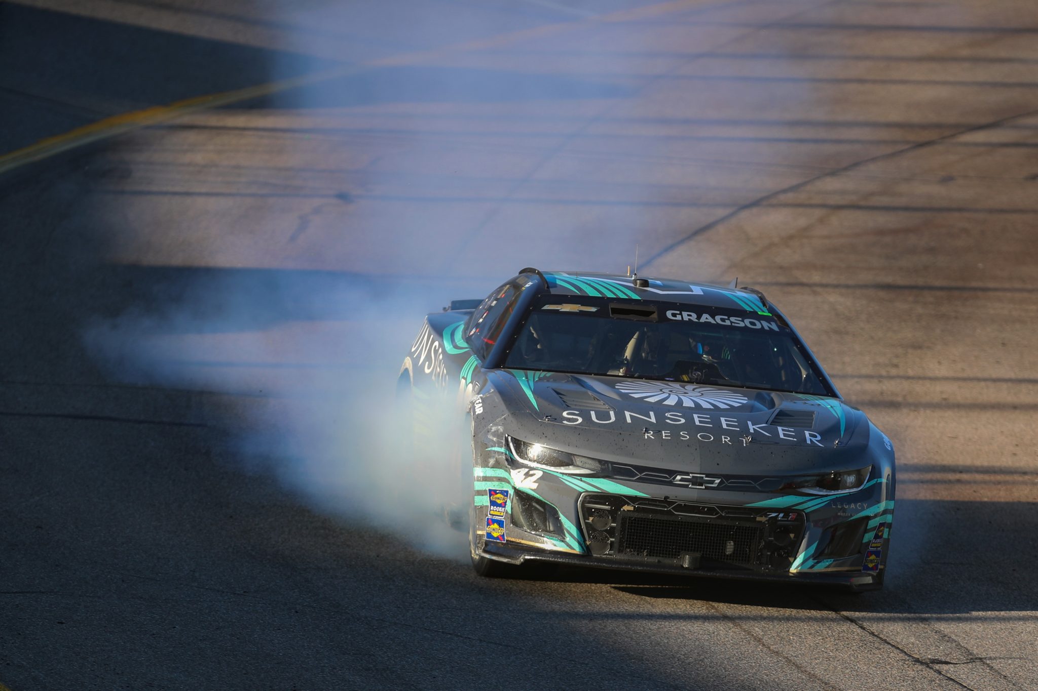 RICHMOND, VIRGINIA - APRIL 02: Noah Gragson, driver of the #42 Sunseeker Resort Chevrolet, drives with smoke during the NASCAR Cup Series Toyota Owners 400 at Richmond Raceway on April 02, 2023 in Richmond, Virginia. (Photo by David Jensen/Getty Images) | Getty Images