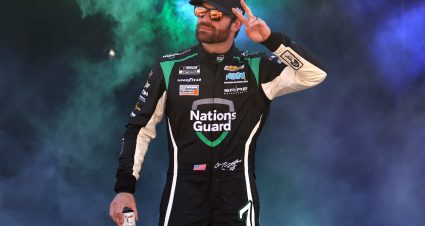 BRISTOL, TENNESSEE - APRIL 09: Corey LaJoie, driver of the #7 NationsGuard Chevrolet, walks onstage during driver intros prior to the NASCAR Cup Series Food City Dirt Race at Bristol Motor Speedway on April 09, 2023 in Bristol, Tennessee. (Photo by James Gilbert/Getty Images) | Getty Images