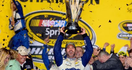 HOMESTEAD, FL - NOVEMBER 20:  Jimmie Johnson, driver of the #48 Lowe's Chevrolet, celebrates with the NASCAR Sprint Cup Series Championship trophy in Victory Lane after winning the NASCAR Sprint Cup Series Ford EcoBoost 400 and the 2016 NASCAR Sprint Cup Series Championship at Homestead-Miami Speedway on November 20, 2016 in Homestead, Florida. Johnson wins a record-tying 7th NASCAR title.  (Photo by Robert Laberge/Getty Images) | Getty Images