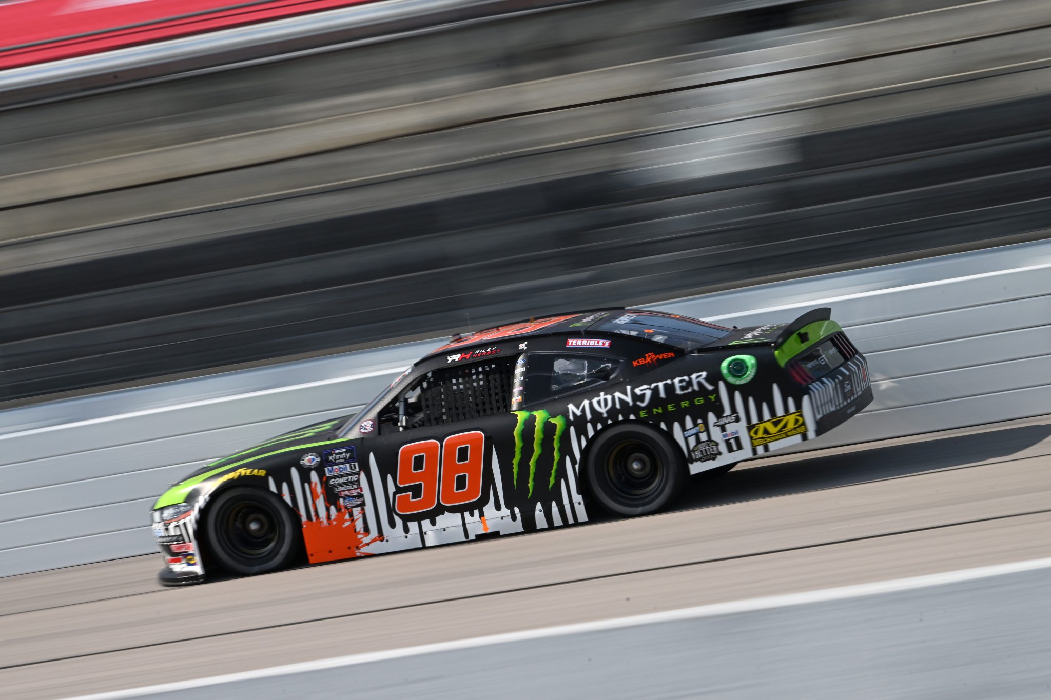 DARLINGTON, SOUTH CAROLINA - MAY 12: Riley Herbst, driver of the #98 Monster Energy Ford, drives during practice for the NASCAR Xfinity Series Shriners Children's 200 at Darlington Raceway on May 12, 2023 in Darlington, South Carolina. (Photo by Logan Riely/Getty Images) | Getty Images