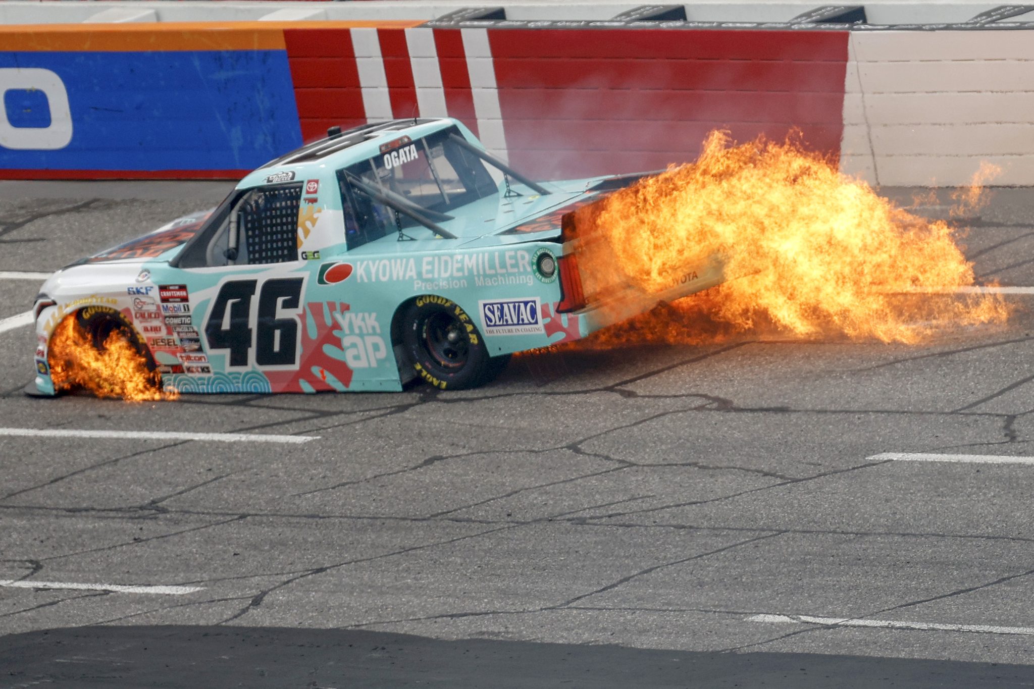 NORTH WILKESBORO, NORTH CAROLINA - MAY 19: Akinori Ogata, driver of the #46 Kyowa-Eidemiller/Asian Pacific Toyota, drives with flames after an on-track incident during practice for the NASCAR Craftsman Truck Series Tyson 250 at North Wilkesboro Speedway on May 19, 2023 in North Wilkesboro, North Carolina. (Photo by Sean Gardner/Getty Images) | Getty Images