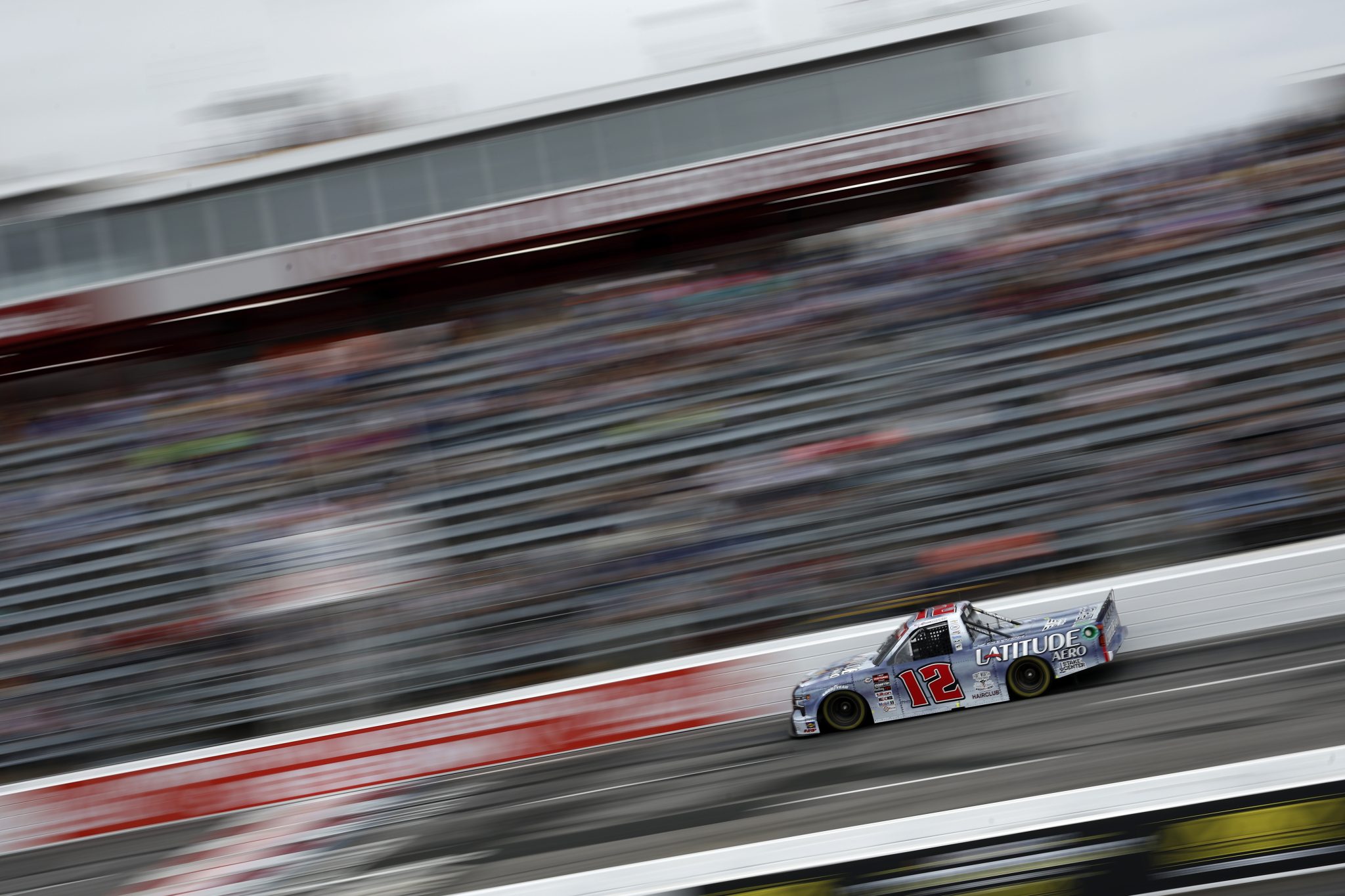 NORTH WILKESBORO, NORTH CAROLINA - MAY 19: Spencer Boyd, driver of the #12 Latitude Aero Chevrolet, drives during practice for the NASCAR Craftsman Truck Series Tyson 250 at North Wilkesboro Speedway on May 19, 2023 in North Wilkesboro, North Carolina. (Photo by Jared C. Tilton/Getty Images) | Getty Images