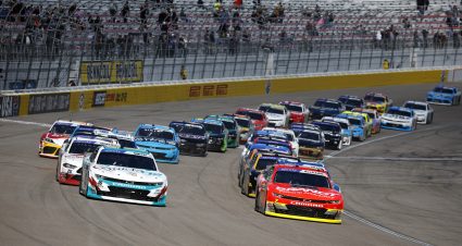 LAS VEGAS, NEVADA - MARCH 04: Chandler Smith, driver of the #16 Quick Tie Products Inc. Chevrolet, and Justin Allgaier, driver of the #7 BRANDT Chevrolet, lead the field during the NASCAR Xfinity Series Alsco Uniforms 300 at Las Vegas Motor Speedway on March 04, 2023 in Las Vegas, Nevada. (Photo by Chris Graythen/Getty Images) | Getty Images