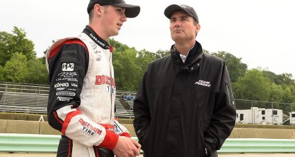 ELKHART LAKE, WI - AUGUST 27:  (L) Austin Cindric, driver of the #22 Discount Tire Ford, speaks with his father, (R) Tim Cindric, while standing next to his car during qualifying for the NASCAR XFINITY Series Johnsonville 180 at Road America on August 27, 2017 in Elkhart Lake, Wisconsin.  Quaifying was canceled due to weather.  (Photo by Stacy Revere/Getty Images) | Getty Images