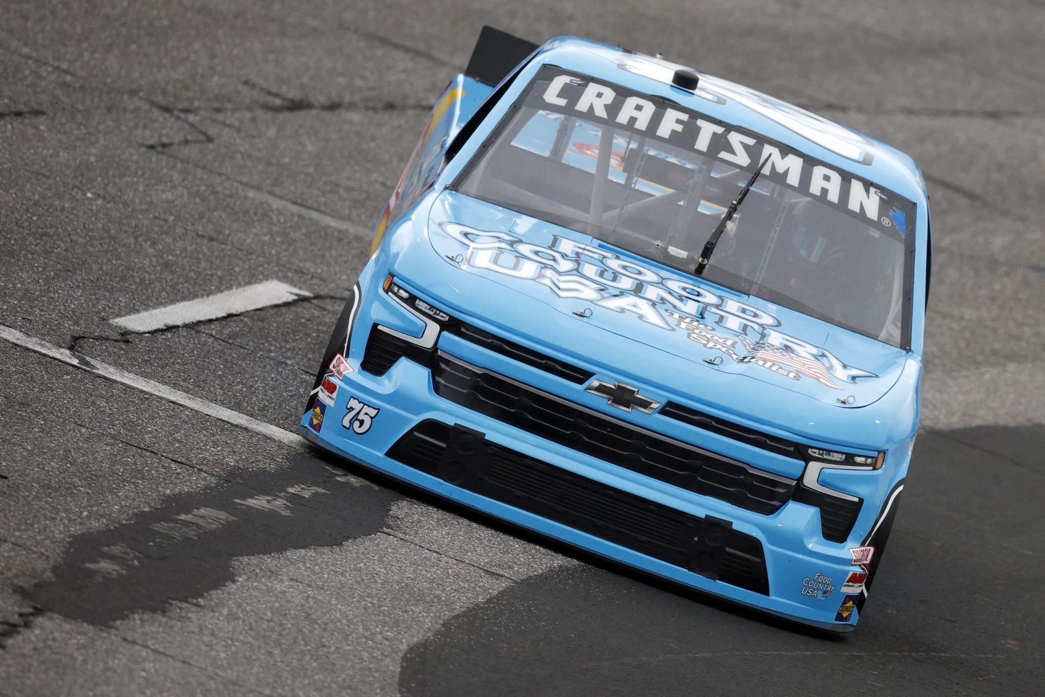 NORTH WILKESBORO, NORTH CAROLINA - MAY 20: Parker Kligerman, driver of the #75 Food Country USA/Lay's Chevrolet, drives during qualifying for the NASCAR Craftsman Truck Series Tyson 250 at North Wilkesboro Speedway on May 20, 2023 in North Wilkesboro, North Carolina. (Photo by Sean Gardner/Getty Images) | Getty Images
