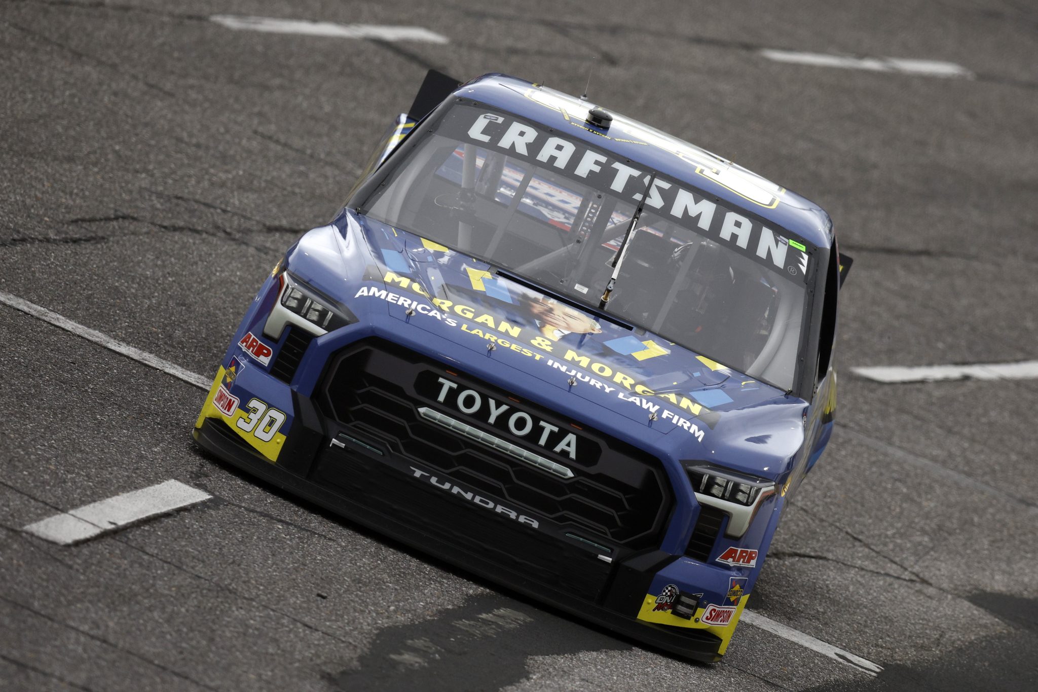 NORTH WILKESBORO, NORTH CAROLINA - MAY 20: Chris Hacker, driver of the #30 Morgan & Morgan Toyota, drives during qualifying for the NASCAR Craftsman Truck Series Tyson 250 at North Wilkesboro Speedway on May 20, 2023 in North Wilkesboro, North Carolina. (Photo by Sean Gardner/Getty Images) | Getty Images
