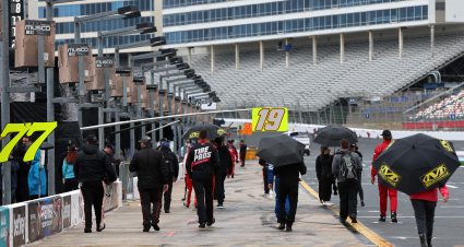 CONCORD, NORTH CAROLINA - MAY 27: NASCAR pit crew members leave the pit area under a weather delay of the NASCAR Xfinity Series Alsco Uniforms 300 at Charlotte Motor Speedway on May 27, 2023 in Concord, North Carolina. (Photo by David Jensen/Getty Images) | Getty Images