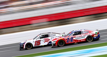 CONCORD, NORTH CAROLINA - MAY 29: Chase Briscoe, driver of the #14 Mahindra Tractors Ford, and JJ Yeley, driver of the #15 Patriot Mobile Ford, race during the NASCAR Cup Series Coca-Cola 600 at Charlotte Motor Speedway on May 29, 2023 in Concord, North Carolina. (Photo by David Jensen/Getty Images) | Getty Images