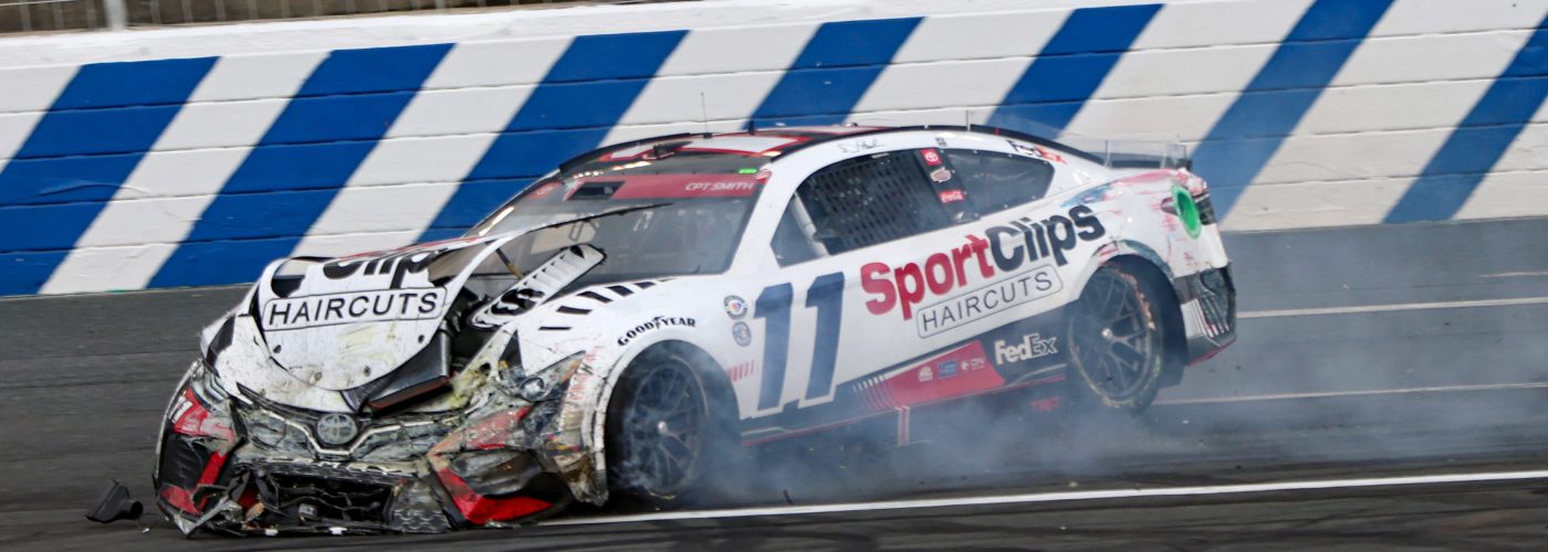 CONCORD, NORTH CAROLINA - MAY 29: Denny Hamlin, driver of the #11 Sport Clips Haircuts Toyota, spins after an on-track incident during the NASCAR Cup Series Coca-Cola 600 at Charlotte Motor Speedway on May 29, 2023 in Concord, North Carolina. (Photo by David Jensen/Getty Images) | Getty Images