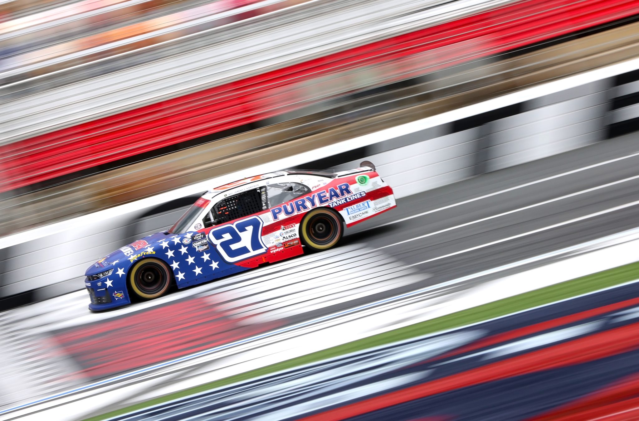 CONCORD, NORTH CAROLINA - MAY 29: Jeb Burton, driver of the #27 Puryear Tank Lines Chevrolet, drives during the NASCAR Xfinity Series Alsco Uniforms 300 at Charlotte Motor Speedway on May 29, 2023 in Concord, North Carolina. (Photo by David Jensen/Getty Images) | Getty Images