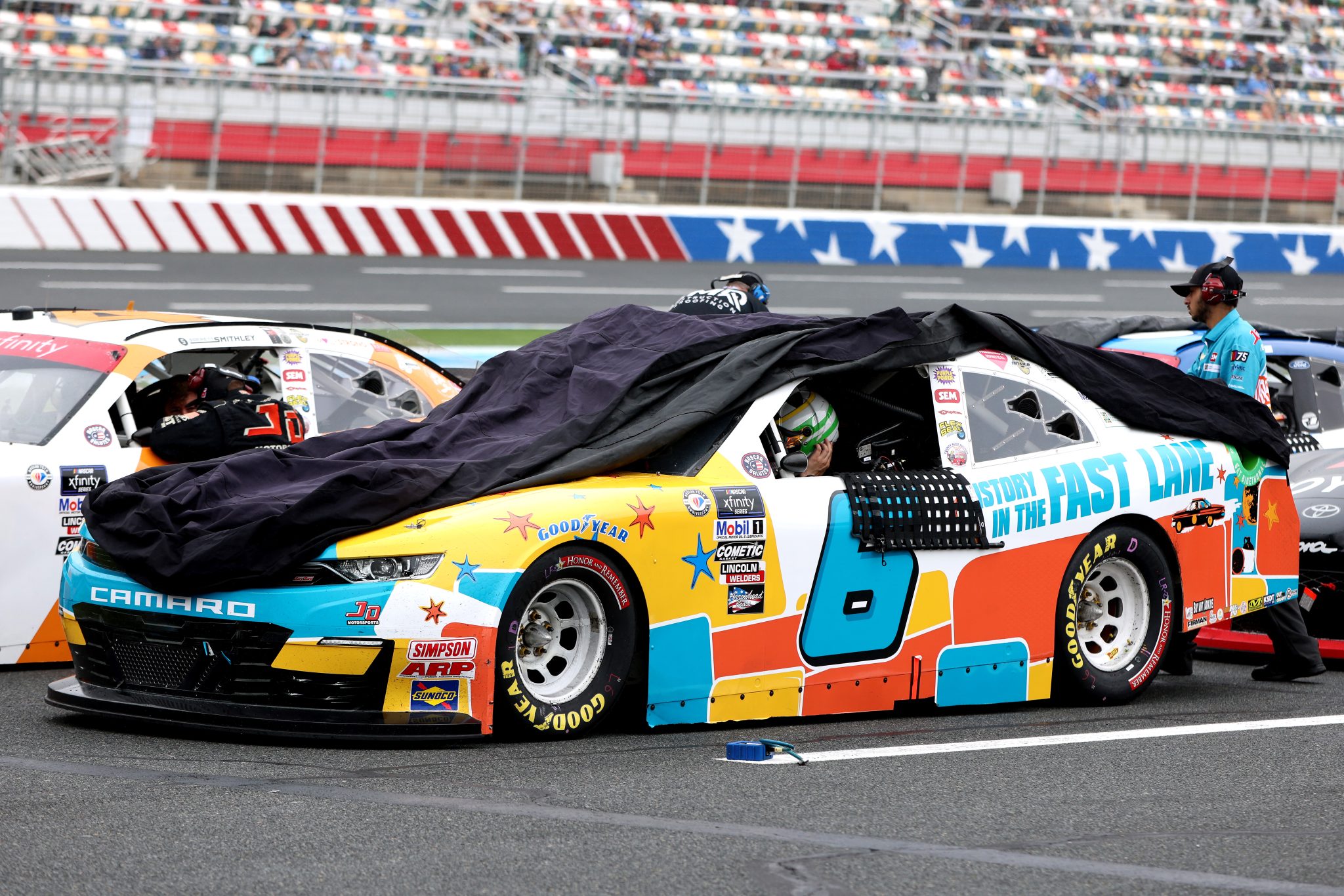 CONCORD, NORTH CAROLINA - MAY 29: A general view of the #6 Moonshine & Motorsports Trail Chevrolet, driven by Brennan Poole parked on the grid during a weather delay of the NASCAR Xfinity Series Alsco Uniforms 300 at Charlotte Motor Speedway on May 29, 2023 in Concord, North Carolina. (Photo by David Jensen/Getty Images) | Getty Images