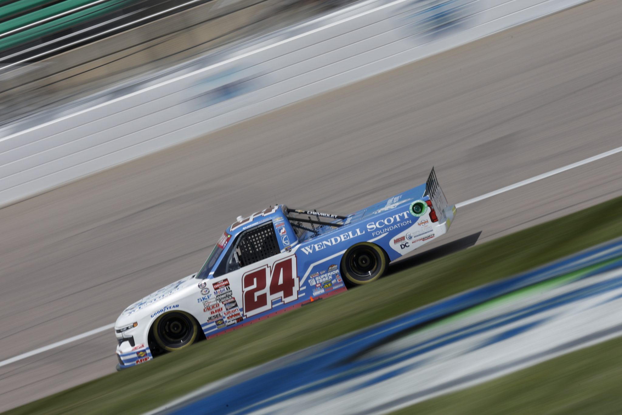 KANSAS CITY, KANSAS - MAY 06: Rajah Caruth, driver of the #24 Wendell Scott Foundation Chevrolet drives during qualifying for the NASCAR Craftsman Truck Series Heart of America 200 at Kansas Speedway on May 06, 2023 in Kansas City, Kansas. (Photo by Sean Gardner/Getty Images) | Getty Images