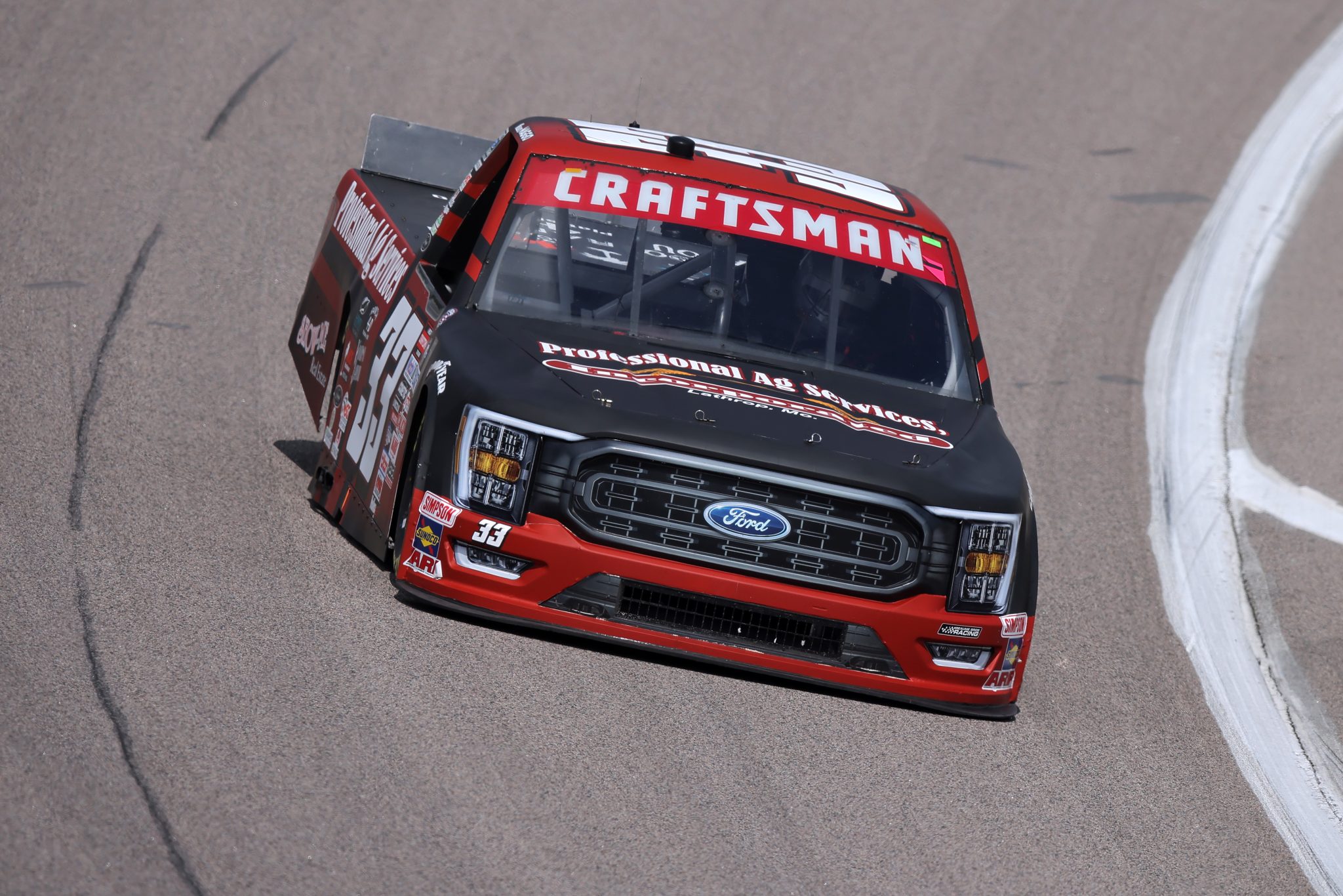 KANSAS CITY, KANSAS - MAY 06: Mason Maggio, driver of the #33 Professional AG Services Ford drives during practice for the NASCAR Craftsman Truck Series Heart of America 200 at Kansas Speedway on May 06, 2023 in Kansas City, Kansas. (Photo by Jonathan Bachman/Getty Images) | Getty Images