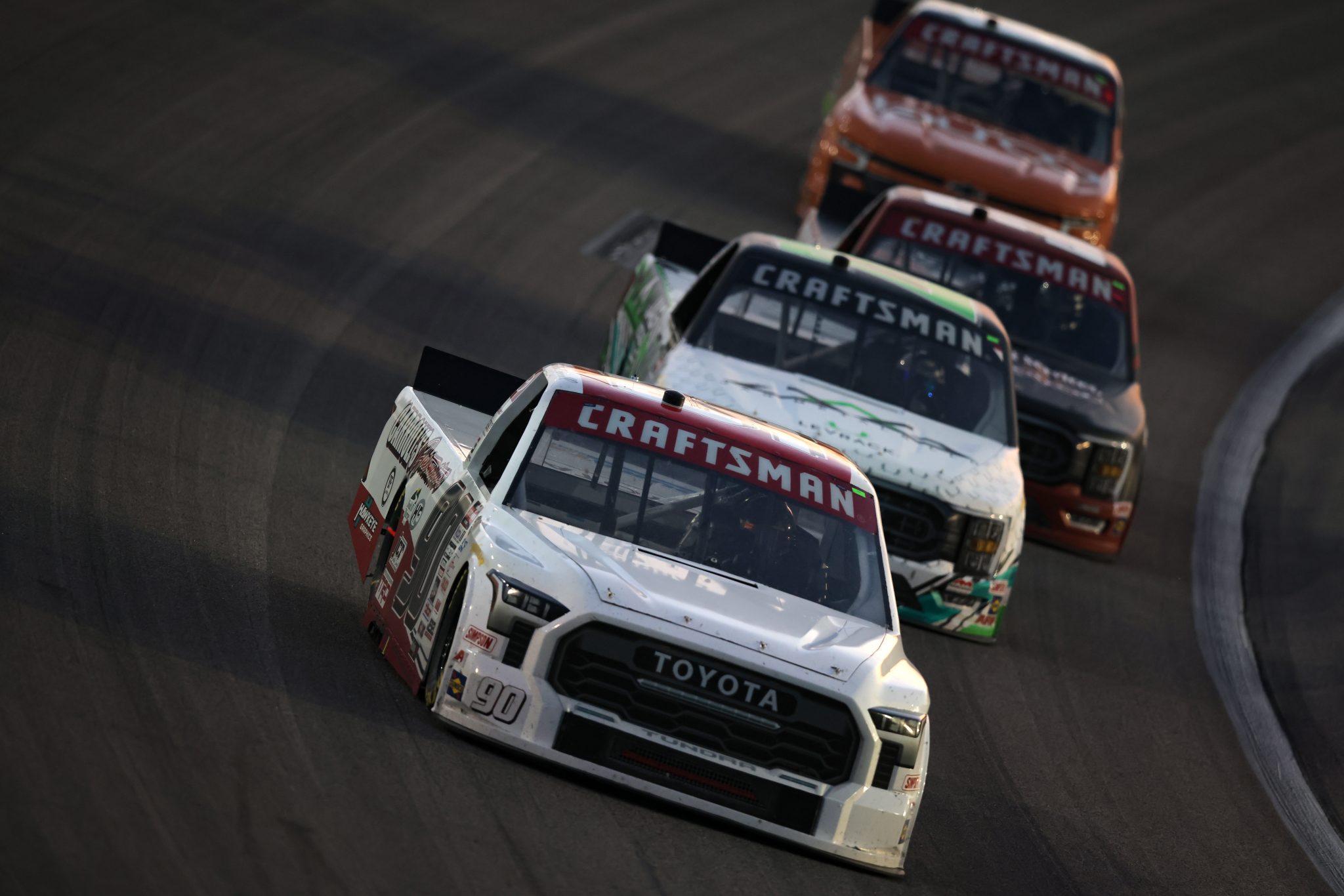 KANSAS CITY, KANSAS - MAY 06: Justin Carroll, driver of the #90 Carroll's Automotive/Duratain Toyota, drives during the NASCAR Craftsman Truck Series Heart of America 200 at Kansas Speedway on May 06, 2023 in Kansas City, Kansas. (Photo by Jonathan Bachman/Getty Images) | Getty Images