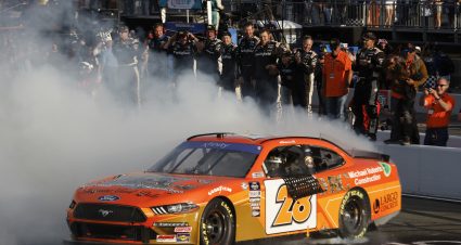 SONOMA, CALIFORNIA - JUNE 10: Aric Almirola, driver of the #28 Michael Roberts Construction Ford, celebrates with a burnout after winning the NASCAR Xfinity Series DoorDash 250 at Sonoma Raceway on June 10, 2023 in Sonoma, California. (Photo by Sean Gardner/Getty Images) | Getty Images