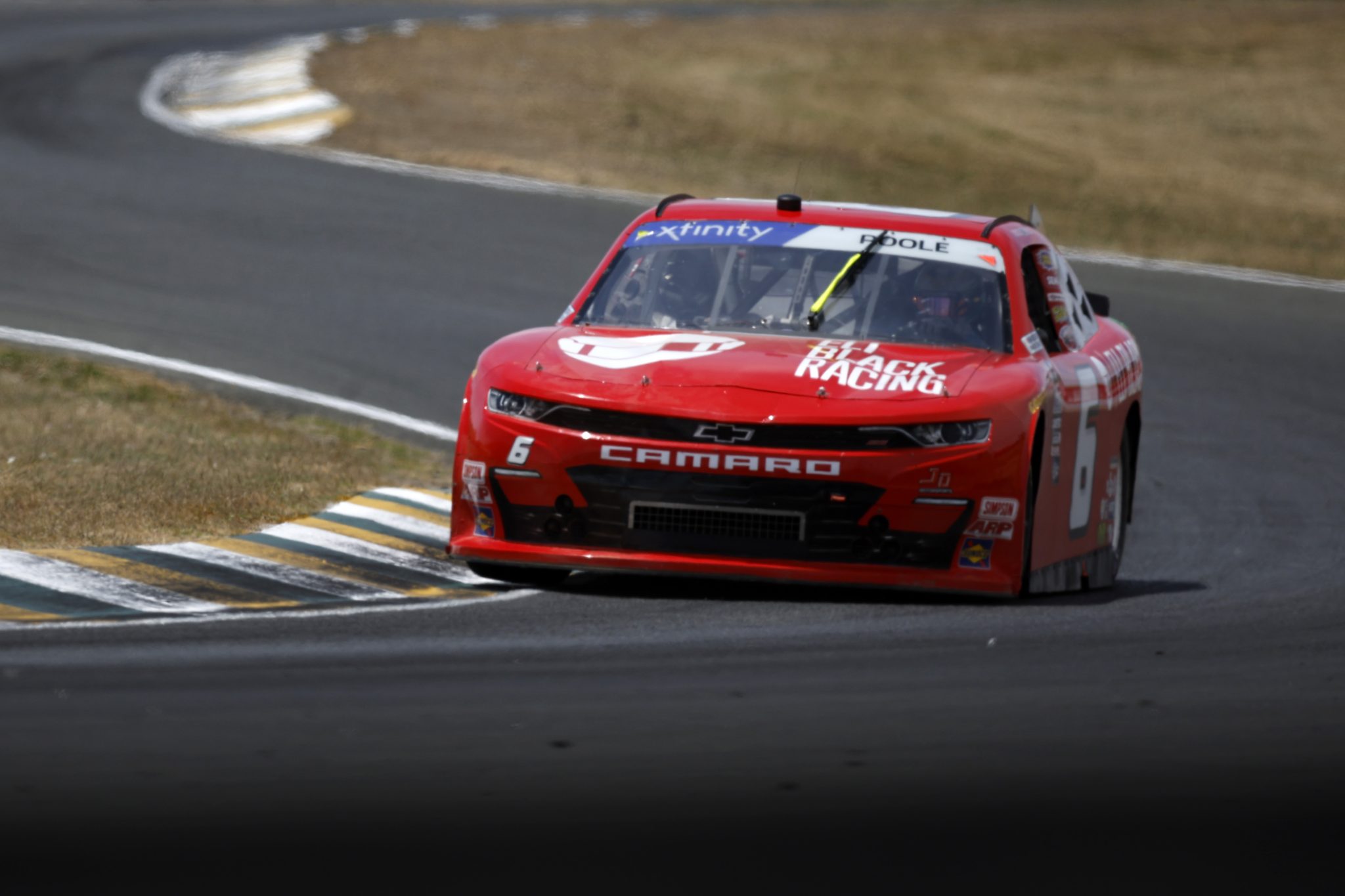 SONOMA, CALIFORNIA - JUNE 09: Brennan Poole, driver of the #6 Eli Black Racing Chevrolet, drives during practice for the NASCAR Xfinity Series DoorDash 250 at Sonoma Raceway on June 09, 2023 in Sonoma, California. (Photo by Sean Gardner/Getty Images) | Getty Images