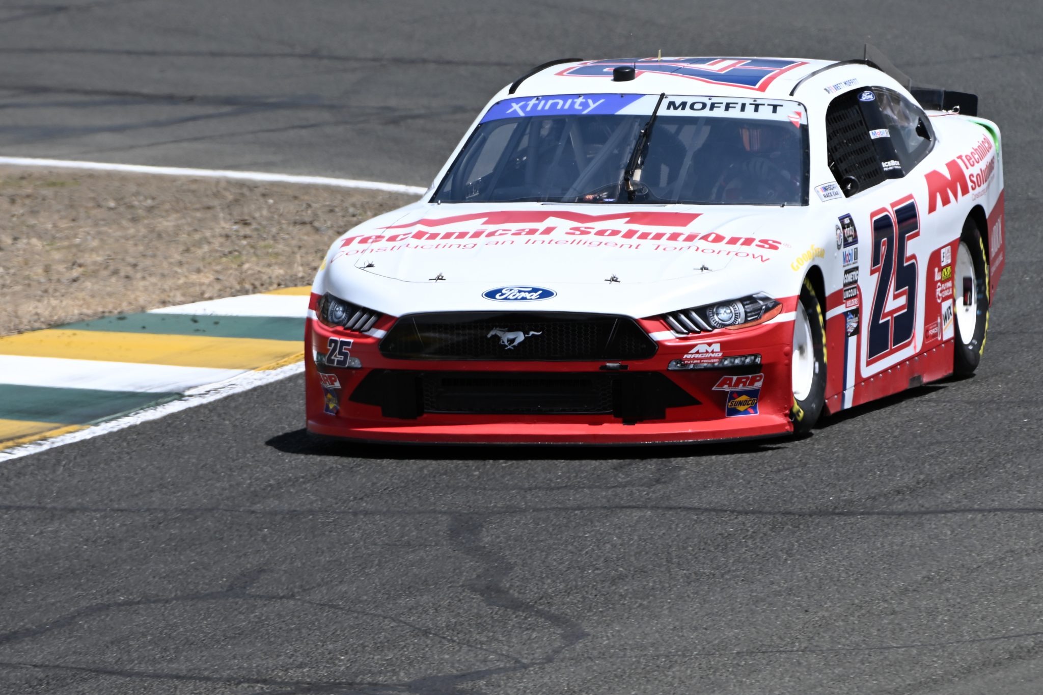 SONOMA, CALIFORNIA - JUNE 10: Brett Moffitt, driver of the #25 AM Technical Solutions Ford, drives during qualifying for the NASCAR Xfinity Series DoorDash 250 at Sonoma Raceway on June 10, 2023 in Sonoma, California. (Photo by Logan Riely/Getty Images) | Getty Images