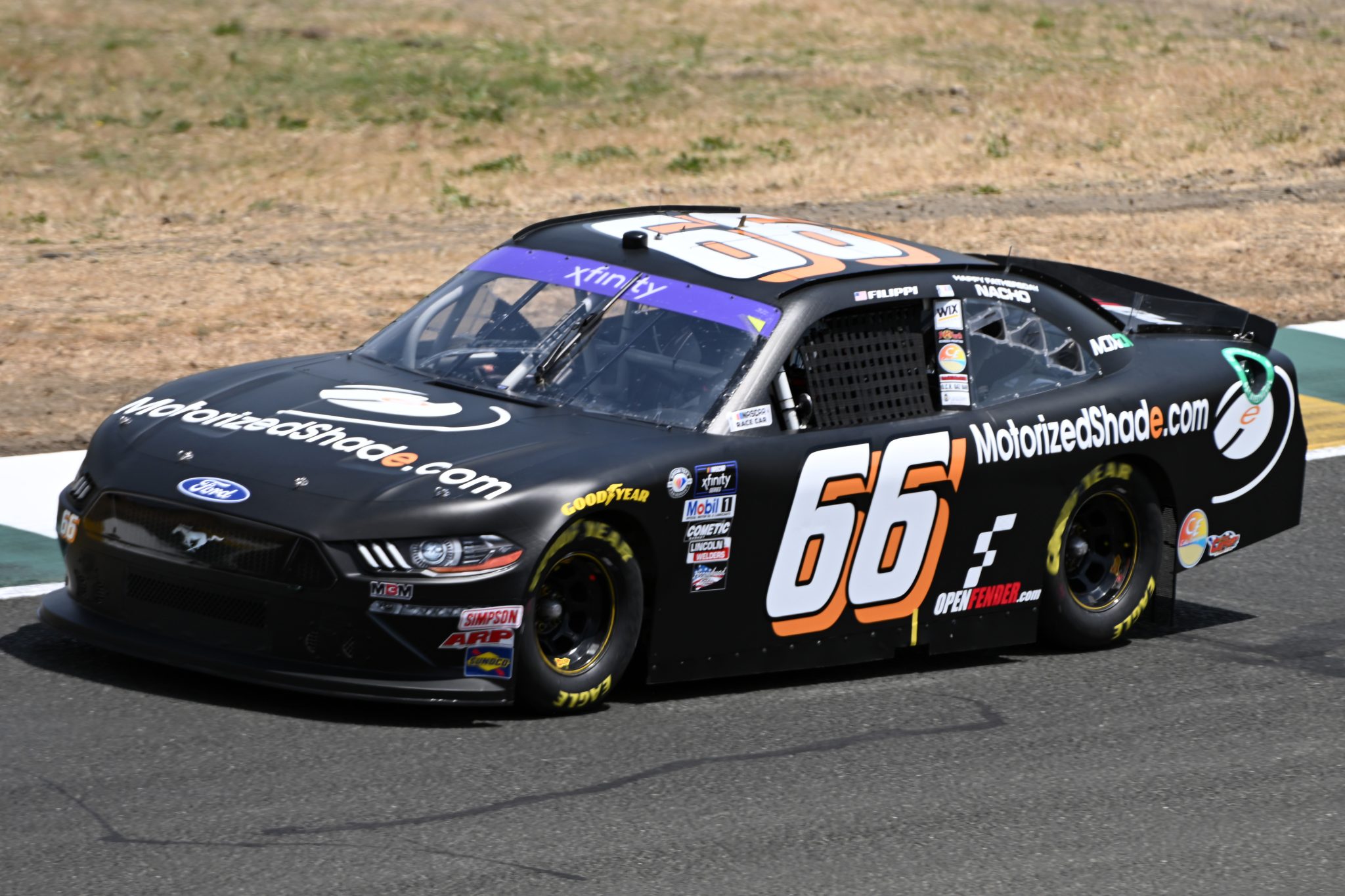 SONOMA, CALIFORNIA - JUNE 10: Mason Filippi, driver of the #66 MotorizedShade.com Ford, drives during qualifying for the NASCAR Xfinity Series DoorDash 250 at Sonoma Raceway on June 10, 2023 in Sonoma, California. (Photo by Logan Riely/Getty Images) | Getty Images