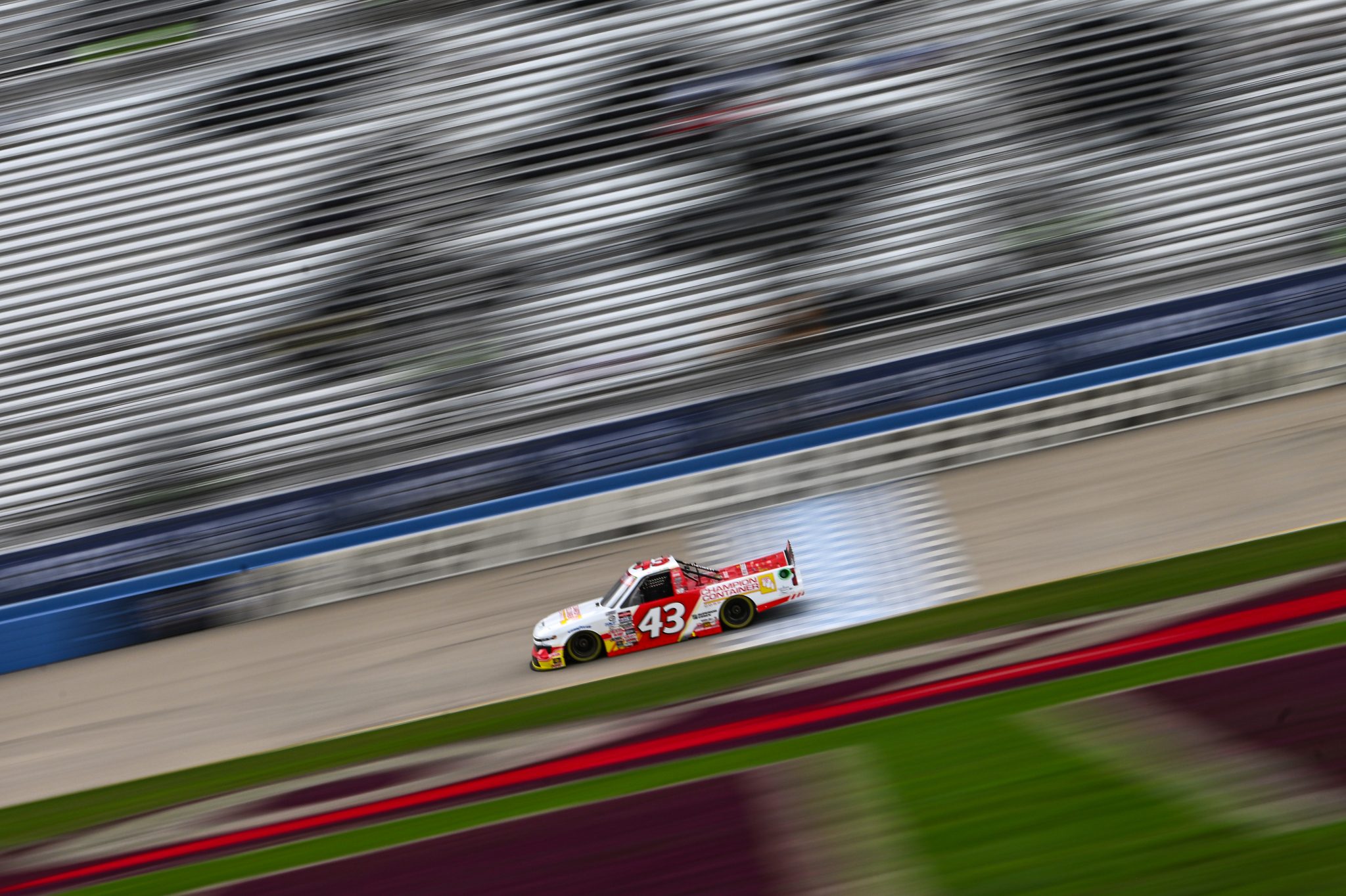 LEBANON, TENNESSEE - JUNE 23: Daniel Dye, driver of the #43 Champion Container Chevrolet, drives during practice for the NASCAR Craftsman Truck Series Rackley Roofing 200 at Nashville Superspeedway on June 23, 2023 in Lebanon, Tennessee. (Photo by Logan Riely/Getty Images) | Getty Images