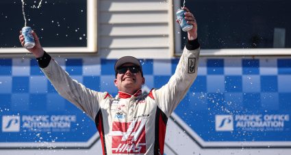 PORTLAND, OREGON - JUNE 03: Cole Custer, driver of the #00 Haas Automation Ford, celebrates in victory lane after winning the NASCAR Xfinity Series Pacific Office Automation 147 at Portland International Raceway on June 03, 2023 in Portland, Oregon. (Photo by James Gilbert/Getty Images) | Getty Images