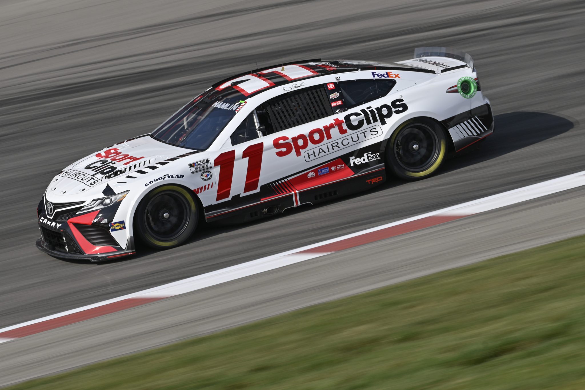 MADISON, ILLINOIS - JUNE 03: Denny Hamlin, driver of the #11 Sport Clips Haircuts Toyota, drives during practice for the NASCAR Cup Series Enjoy Illinois 300 at WWT Raceway on June 03, 2023 in Madison, Illinois. (Photo by Jeff Curry/Getty Images) | Getty Images
