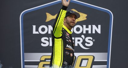 MARTINSVILLE, VIRGINIA - APRIL 14: Matt Crafton, driver of the #88 Jack Links/Menards Ford, waves to fans as he walks onstage during driver intros prior tothe NASCAR Craftsman Truck Series Long John Silver's 200 at Martinsville Speedway on April 14, 2023 in Martinsville, Virginia. (Photo by Sean Gardner/Getty Images) | Getty Images