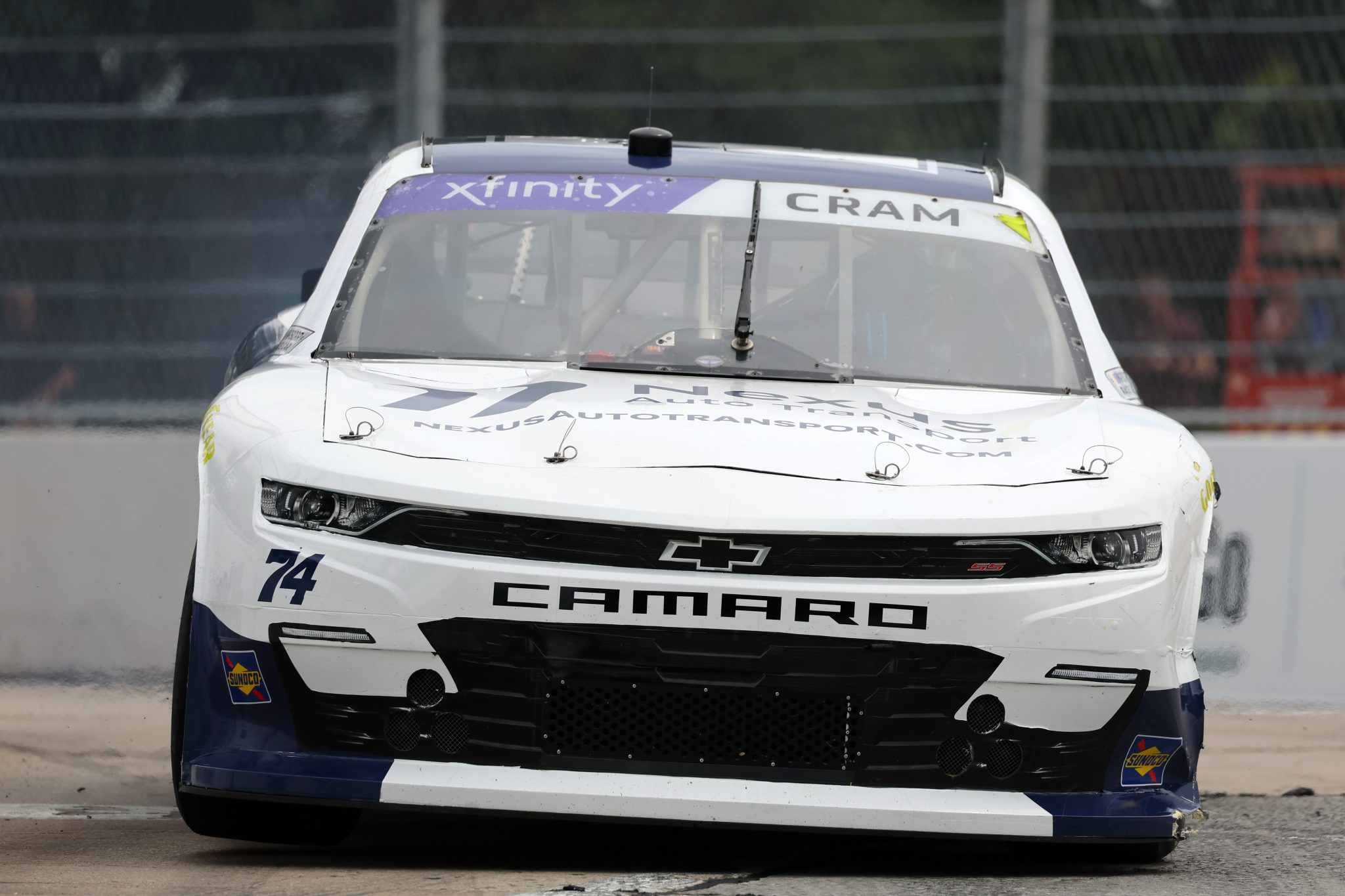 CHICAGO, ILLINOIS - JULY 01: Dawson Cram, driver of the #74 Nexus Auto Transport Chevrolet, drives during qualifying for the NASCAR Xfinity Series The Loop 121 at the Chicago Street Course on July 01, 2023 in Chicago, Illinois. (Photo by Michael Reaves/Getty Images) | Getty Images