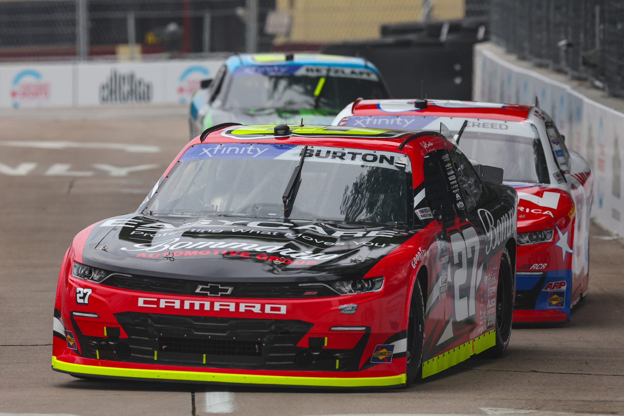 CHICAGO, ILLINOIS - JULY 01: Jeb Burton, driver of the #27 Bommarito.com/EasyCare Chevrolet, and Sheldon Creed, driver of the #2 Whelen Chevrolet, drive during practice for the NASCAR Xfinity Series The Loop 121 at the Chicago Street Course on July 01, 2023 in Chicago, Illinois. (Photo by Michael Reaves/Getty Images) | Getty Images