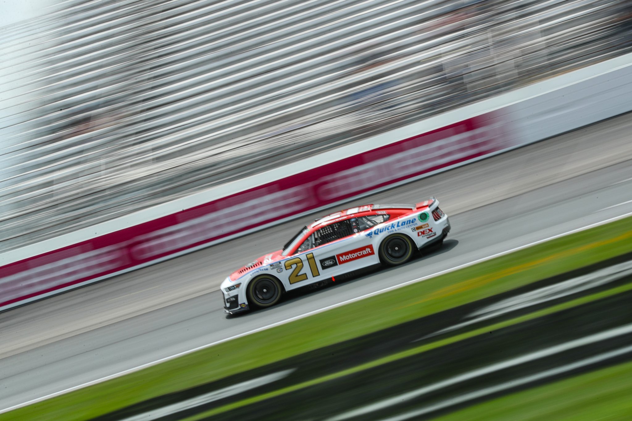 LOUDON, NEW HAMPSHIRE - JULY 15: Harrison Burton, driver of the #21 Motorcraft/Quick Lane Ford, drives during qualifying for the NASCAR Cup Series Crayon 301 at New Hampshire Motor Speedway on July 15, 2023 in Loudon, New Hampshire. (Photo by Meg Oliphant/Getty Images) | Getty Images