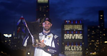 CHICAGO, ILLINOIS - JULY 02: Shane Van Gisbergen, driver of the #91 Enhance Health Chevrolet, lifts the Inaugural Grant Park 220 trophy in the Ruoff Mortgage victory lane after winning  the NASCAR Cup Series Grant Park 220 at the Chicago Street Course on July 02, 2023 in Chicago, Illinois. (Photo by Jared C. Tilton/Getty Images) | Getty Images